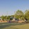 dog park with pet toys and green turf